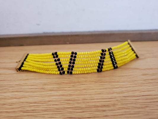 .SUMAK Bracelet - 7 Strand with Yellow & Black Beads