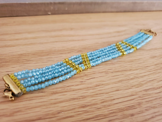 .SUMAK Bracelet - 5 Strand Light Blue with Yellow Accent Beads